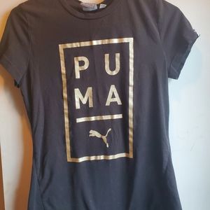 Black and gold Puma shirt.